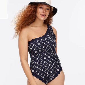 Scalloped one-shoulder swimsuit laser-cut eyelet